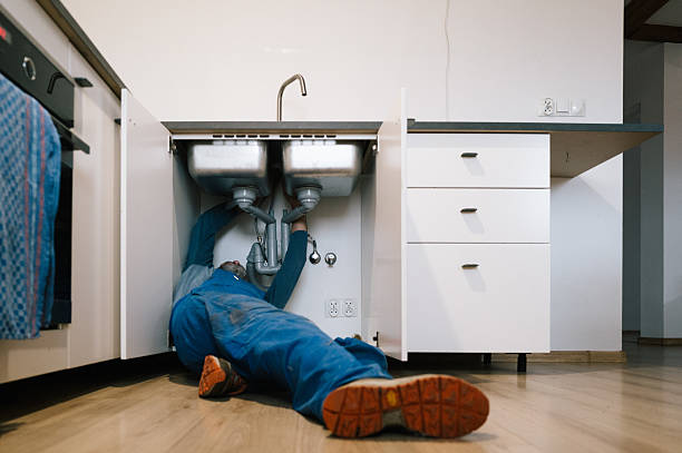 Professional Drain Cleaning technician working in Oak Hill, NY